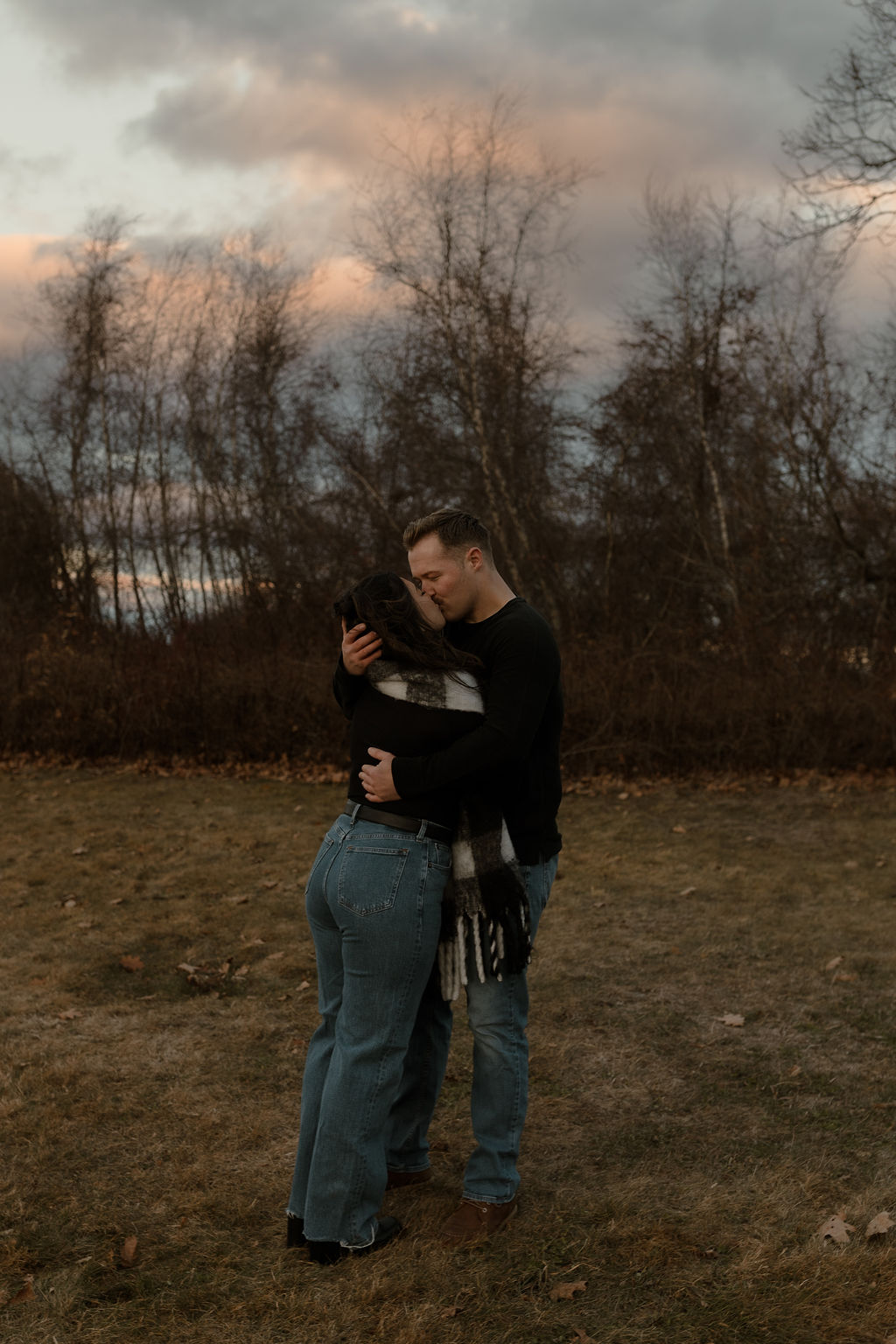 man and woman kissing during their Massachusetts Engagement Photos