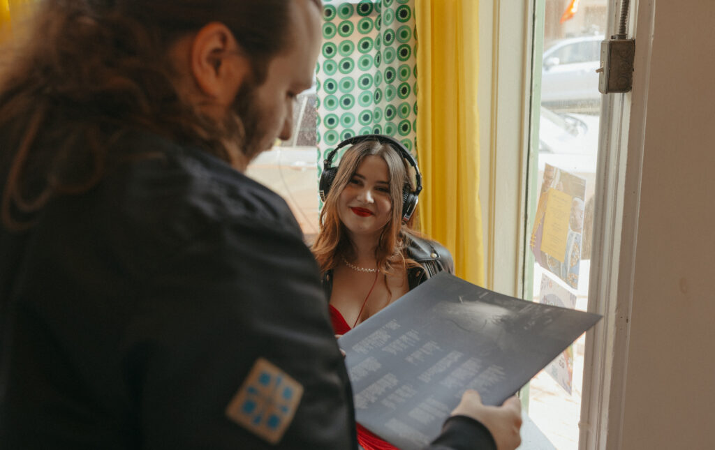 grunge couple listening to music
