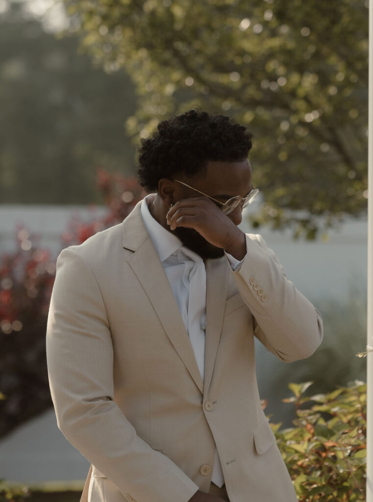 Grooms reaction to bride walking down the isle at Boston Wedding 