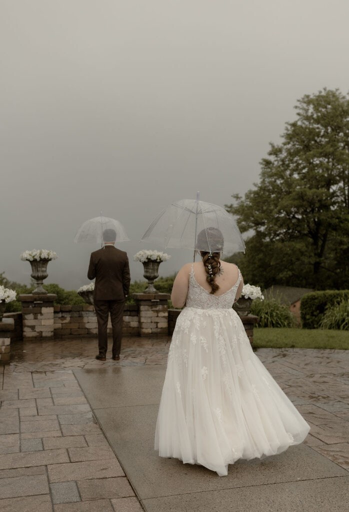 Bride and groom about to share a private first look at a New Hampshire wedding 